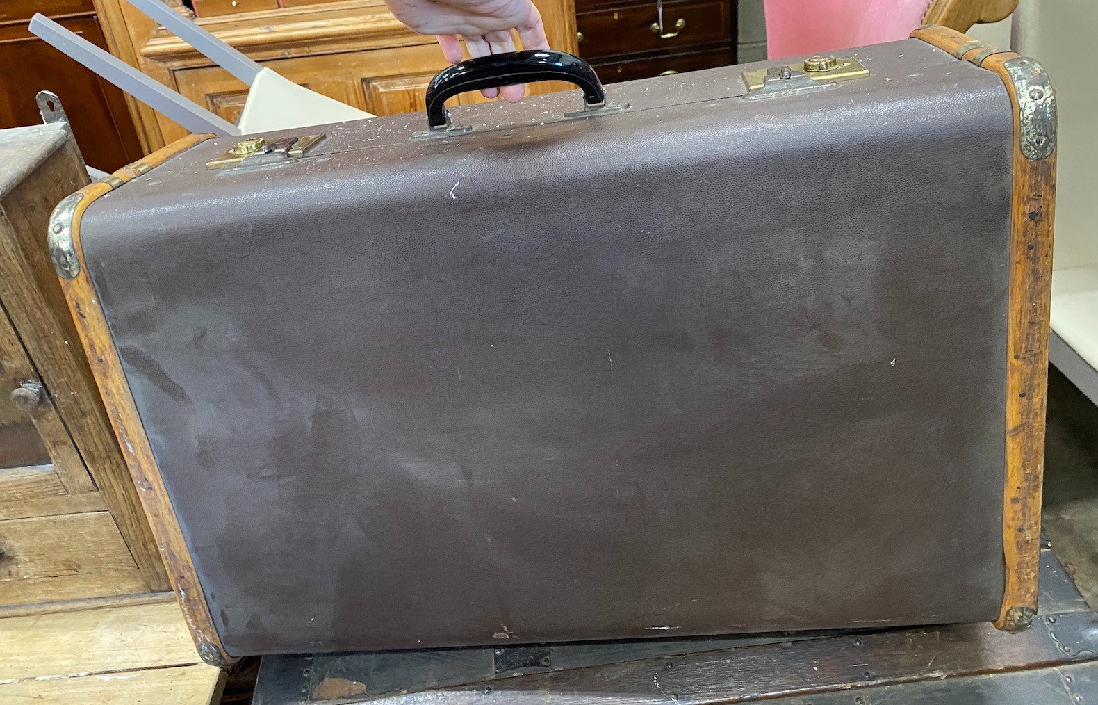 A Victorian wood and iron bound domed trunk, width 78cm, height 54cm, together with a smaller later cabin trunk
